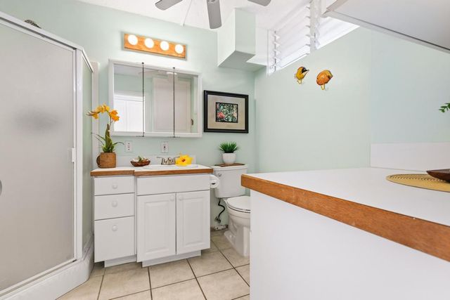 a view of bathroom with a sink and toilet