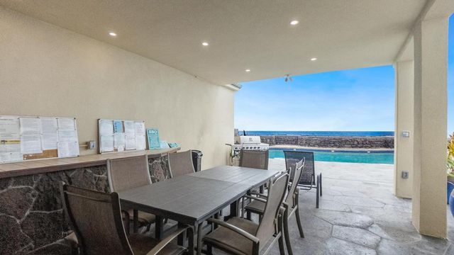 a view of a city with an ocean view