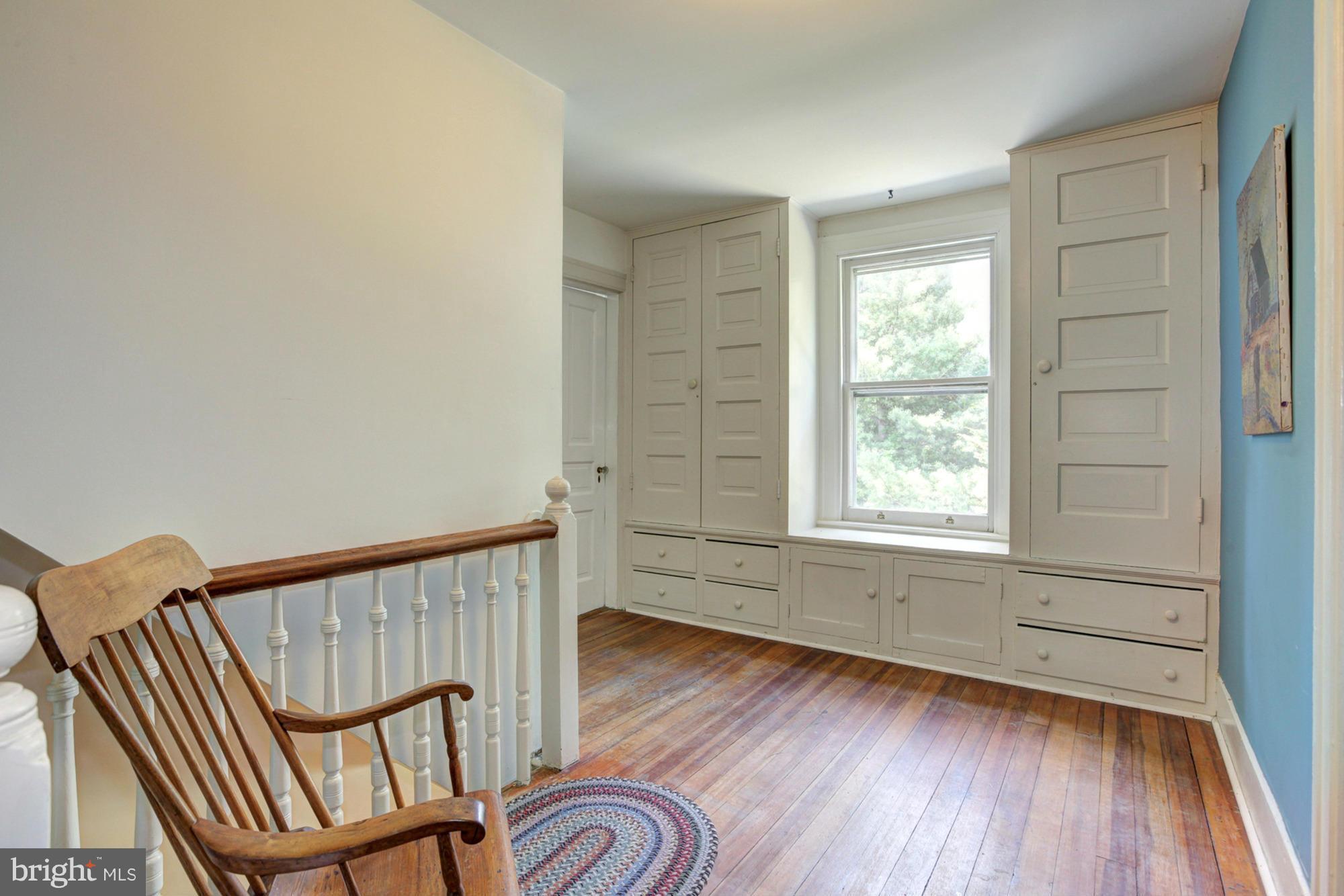 17420 Dr Bird Road Silver Spring, MD 20906 - Photo 16 of 30 UPSTAIRS HALL WITH BUILT INS