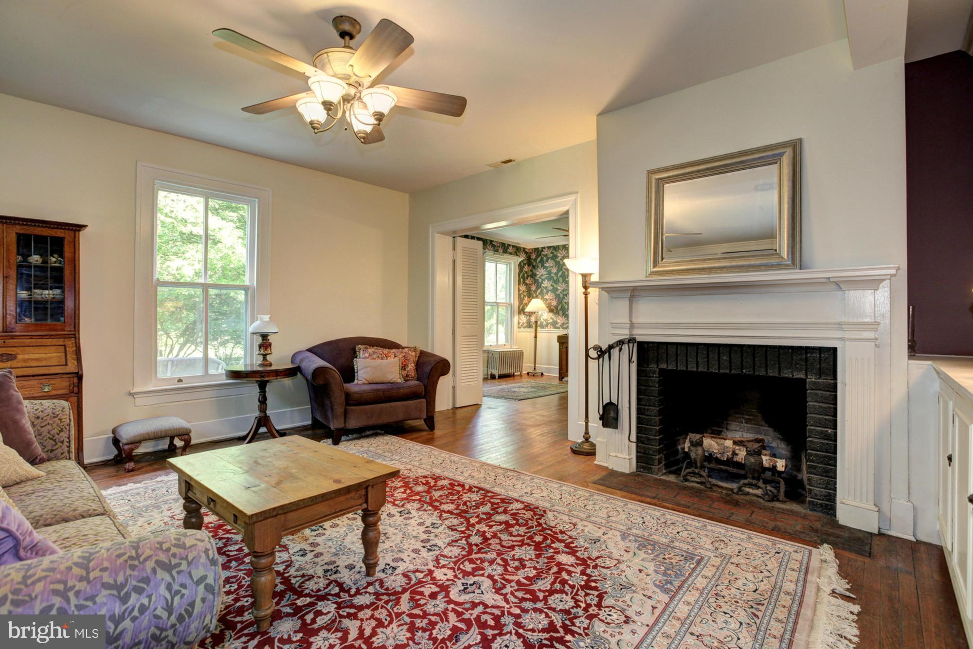 17420 Dr Bird Road Silver Spring, MD 20906 - Photo 7 of 30 FORMAL LIVING ROOM WITH FIREPLACE
