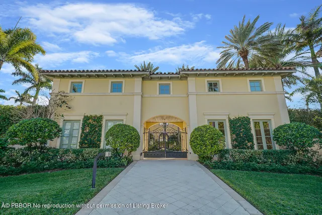 front view of a house with a garden