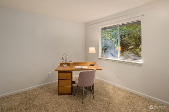 a room with a table and a window