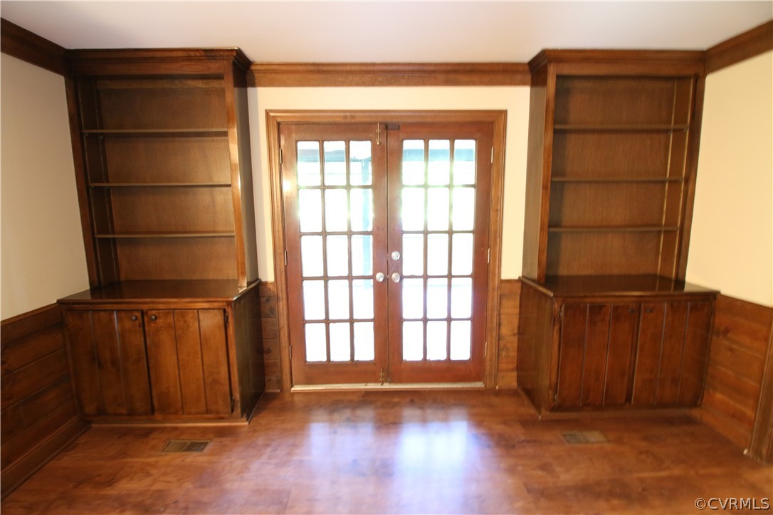 3609 Stoney Ridge Road Midlothian, VA 23112 - Photo 8 of 27 an empty room with wooden floor and windows