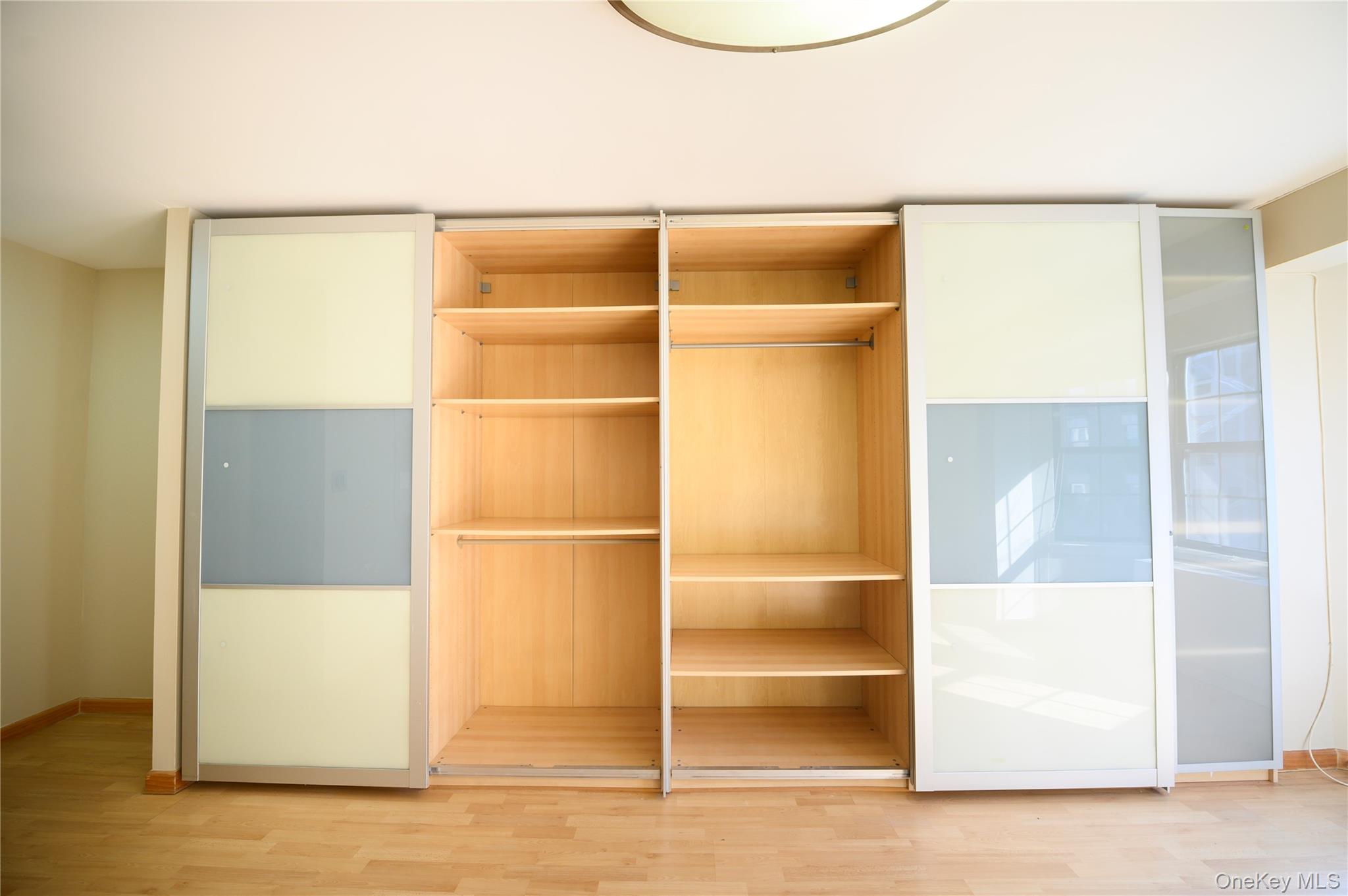 7124 164th Street, Unit 2 Queens, NY 11365 - Photo 19 of 22 a view of a room with a door
