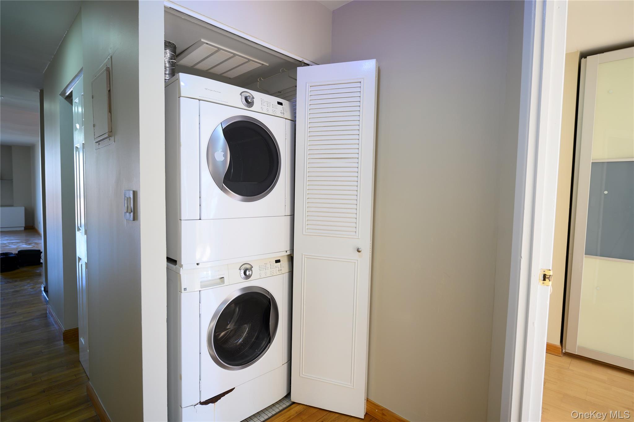 7124 164th Street, Unit 2 Queens, NY 11365 - Photo 20 of 22 a utility room with dryer and washer