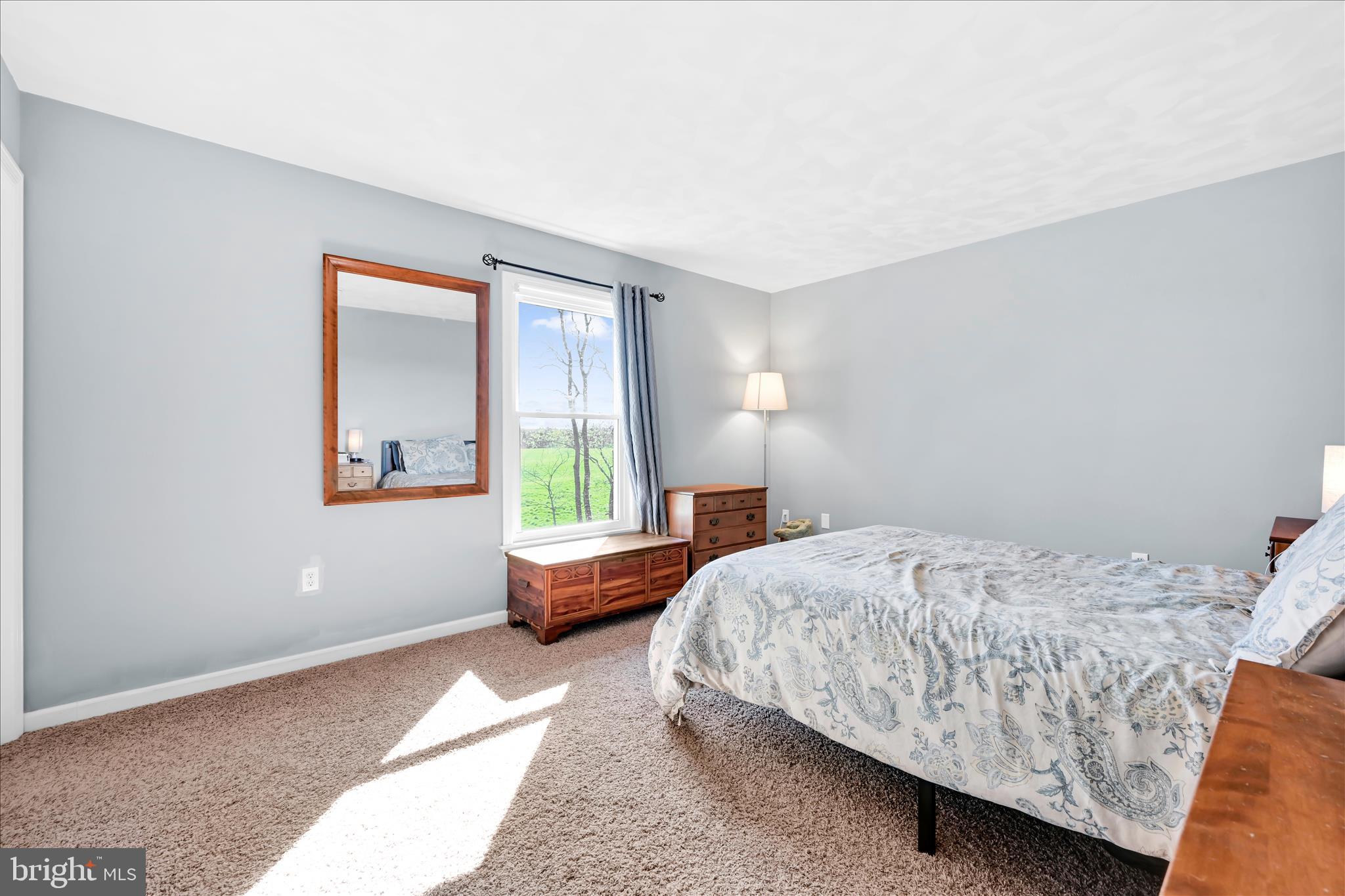 4285 Highland Road Elizabethtown, PA 17022 - Photo 19 of 39 a bedroom with a bed and window