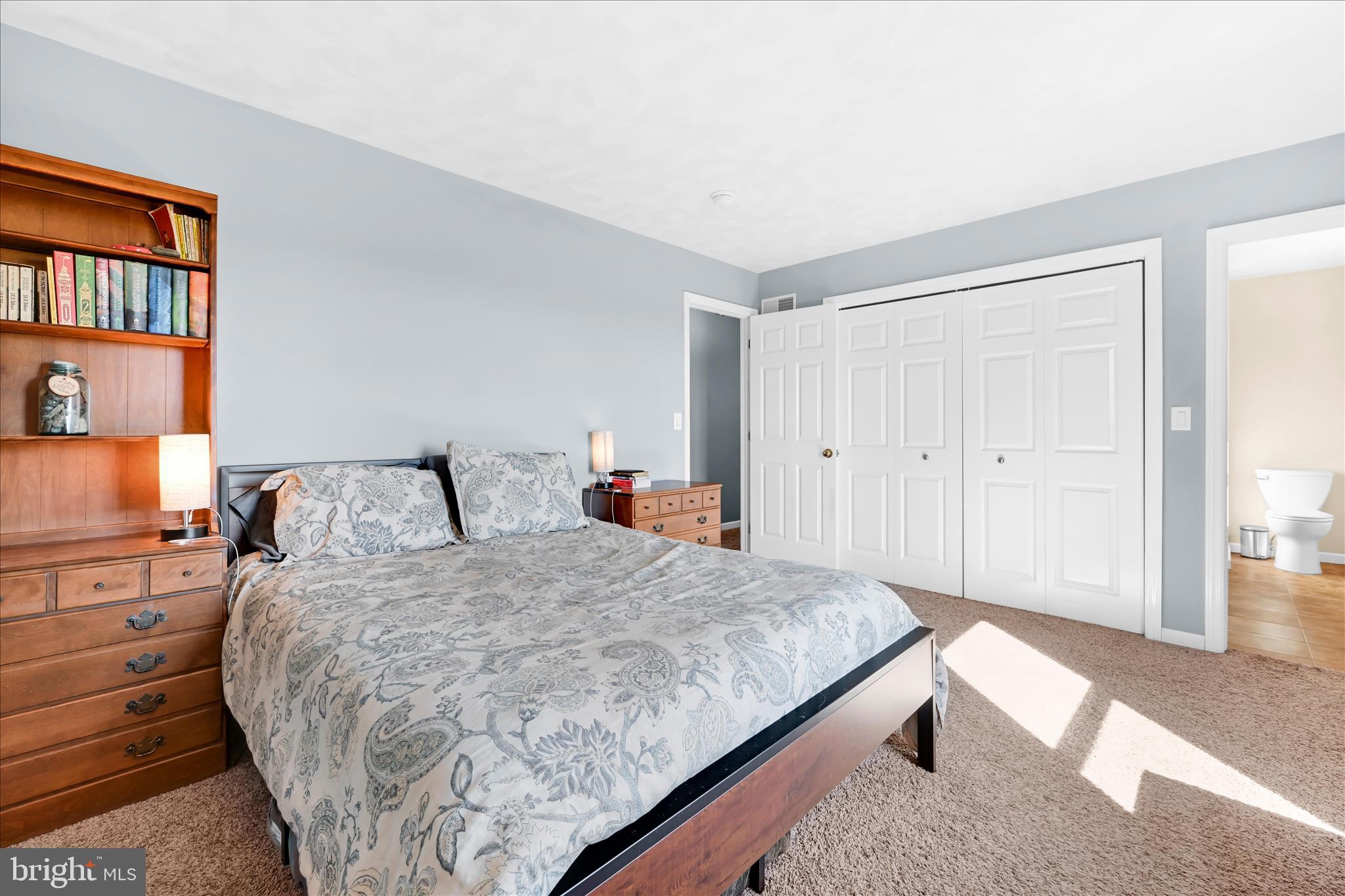 4285 Highland Road Elizabethtown, PA 17022 - Photo 20 of 39 a bedroom with a bed and a painting on the wall