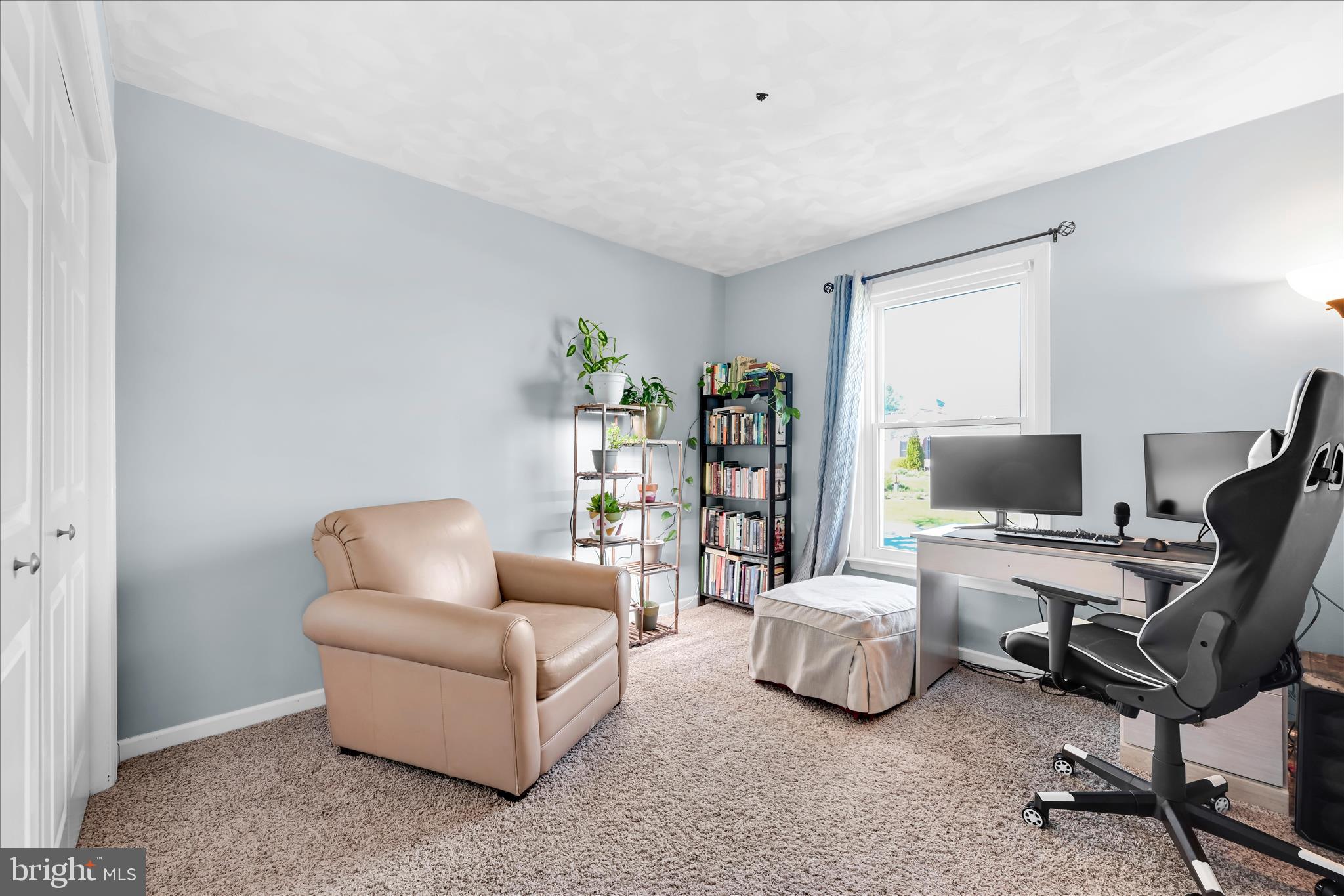 4285 Highland Road Elizabethtown, PA 17022 - Photo 21 of 39 a living room with furniture and a flat screen tv