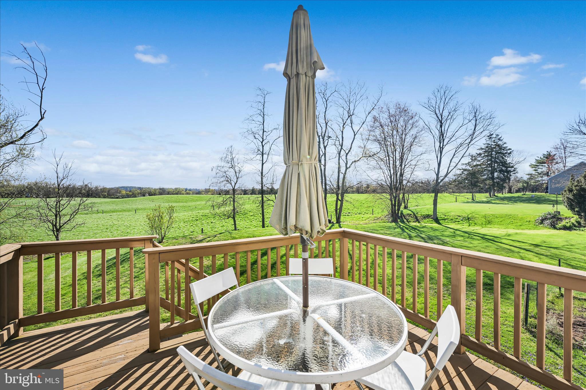 4285 Highland Road Elizabethtown, PA 17022 - Photo 27 of 39 a view of a chairs and table in patio with a yard