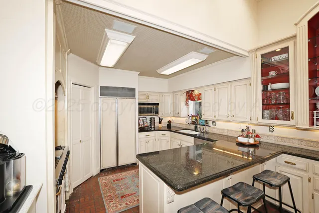 a view of a bedroom from a hallway