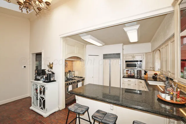 a view of a bedroom from a hallway