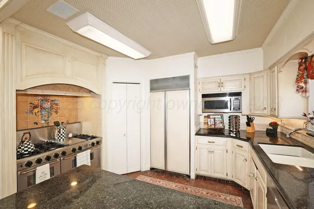 a view of a living room and bathroom