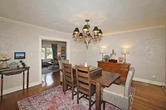 a living room with lots of furniture and a bed