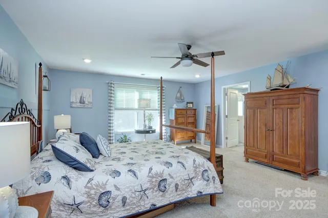 a bathroom with a granite countertop sink mirror and bathtub