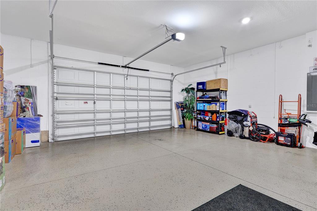 7185 Southwest 63rd Street Ocala, FL 34474 - Photo 31 of 31 a view of a garage with storage