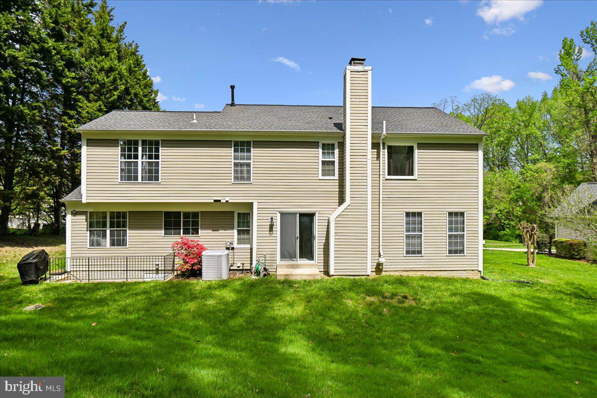 903 Brook Street Accokeek, MD 20607 - Photo 47 of 56 Backyard with Scenic Wooded Backdrop