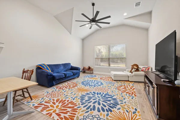 a view of a yard with a tree