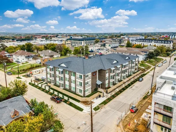 a view of a city with an ocean view