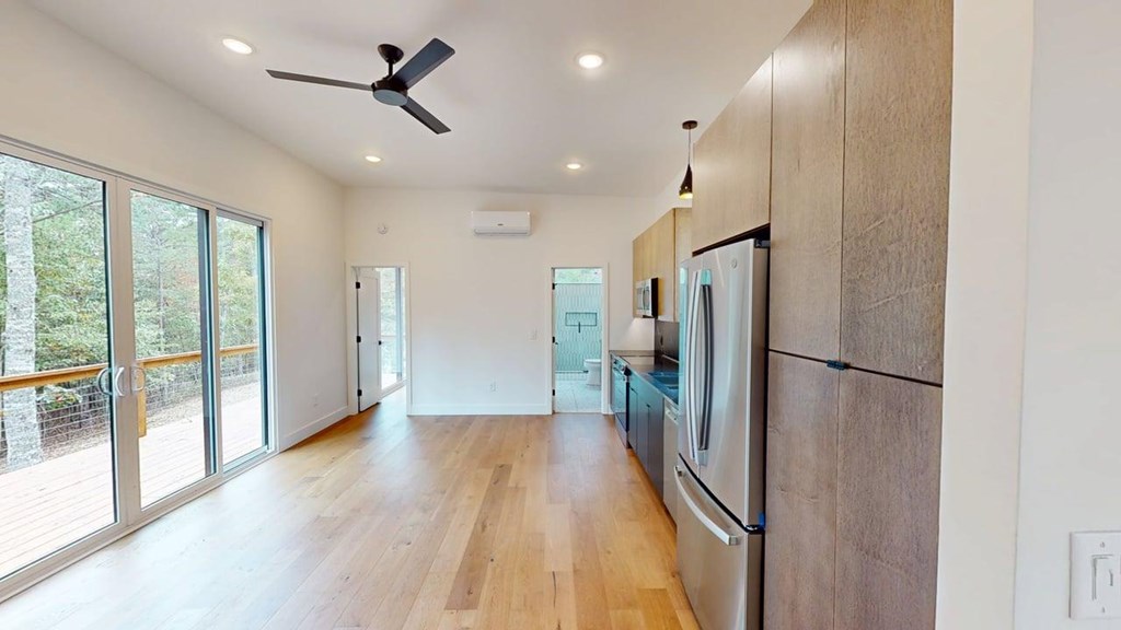 433 Brannon Ridge Young Harris, GA 30582 - Photo 2 of 13 a kitchen with stainless steel appliances a refrigerator and wooden floor