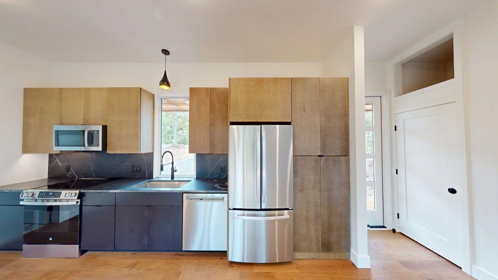 433 Brannon Ridge Young Harris, GA 30582 - Photo 3 of 13 a kitchen with stainless steel appliances granite countertop a refrigerator and a stove top oven