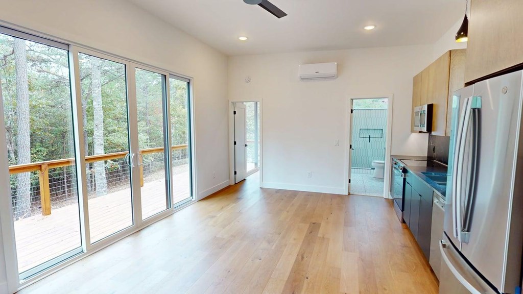 433 Brannon Ridge Young Harris, GA 30582 - Photo 5 of 13 a view of a refrigerator in kitchen and wooden floor