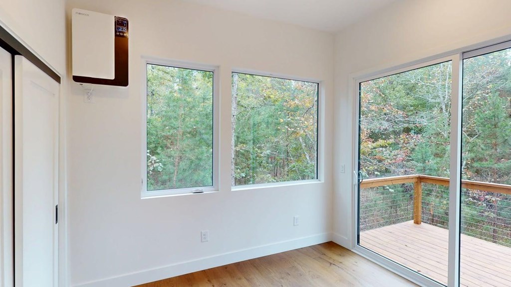433 Brannon Ridge Young Harris, GA 30582 - Photo 9 of 13 a view of a room with wooden floor and windows