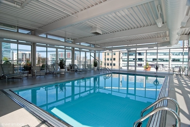 1640 Maple Avenue, Unit 1606 Evanston, IL 60201 - Photo 31 of 40 a view of a swimming pool with outdoor seating