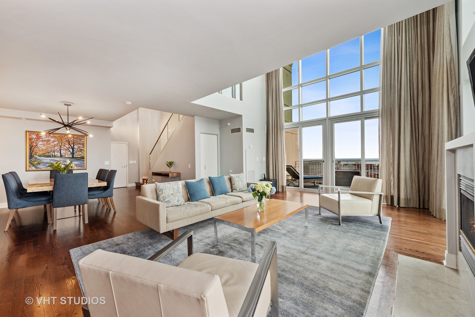 1640 Maple Avenue, Unit 1606 Evanston, IL 60201 - Photo 10 of 40 a living room with furniture and a large window