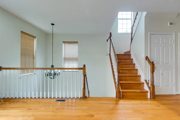a view of entryway with wooden floor