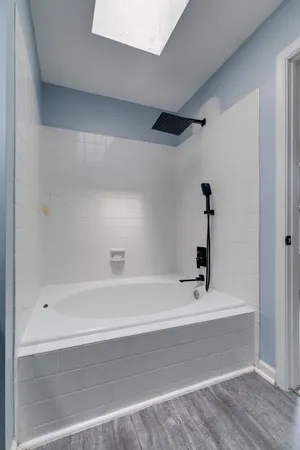 a bathroom with a bathtub