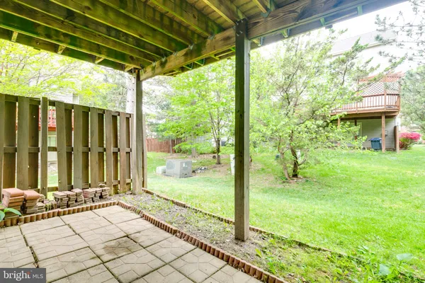 a view of a porch with a backyard