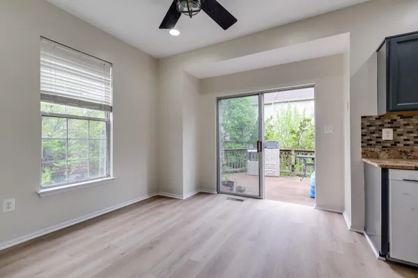 a view of livingroom with furniture wooden floor and window