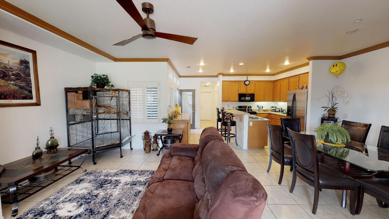 6374 Manzanita Way Riverside, CA 92504 - Photo 34 of 41 a living room with lots of furniture and kitchen view