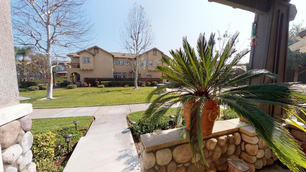 6374 Manzanita Way Riverside, CA 92504 - Photo 8 of 41 a front view of a house with a yard
