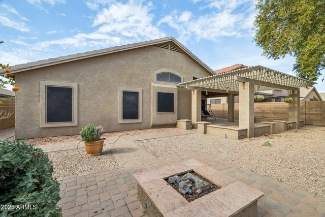 a front view of a house with patio