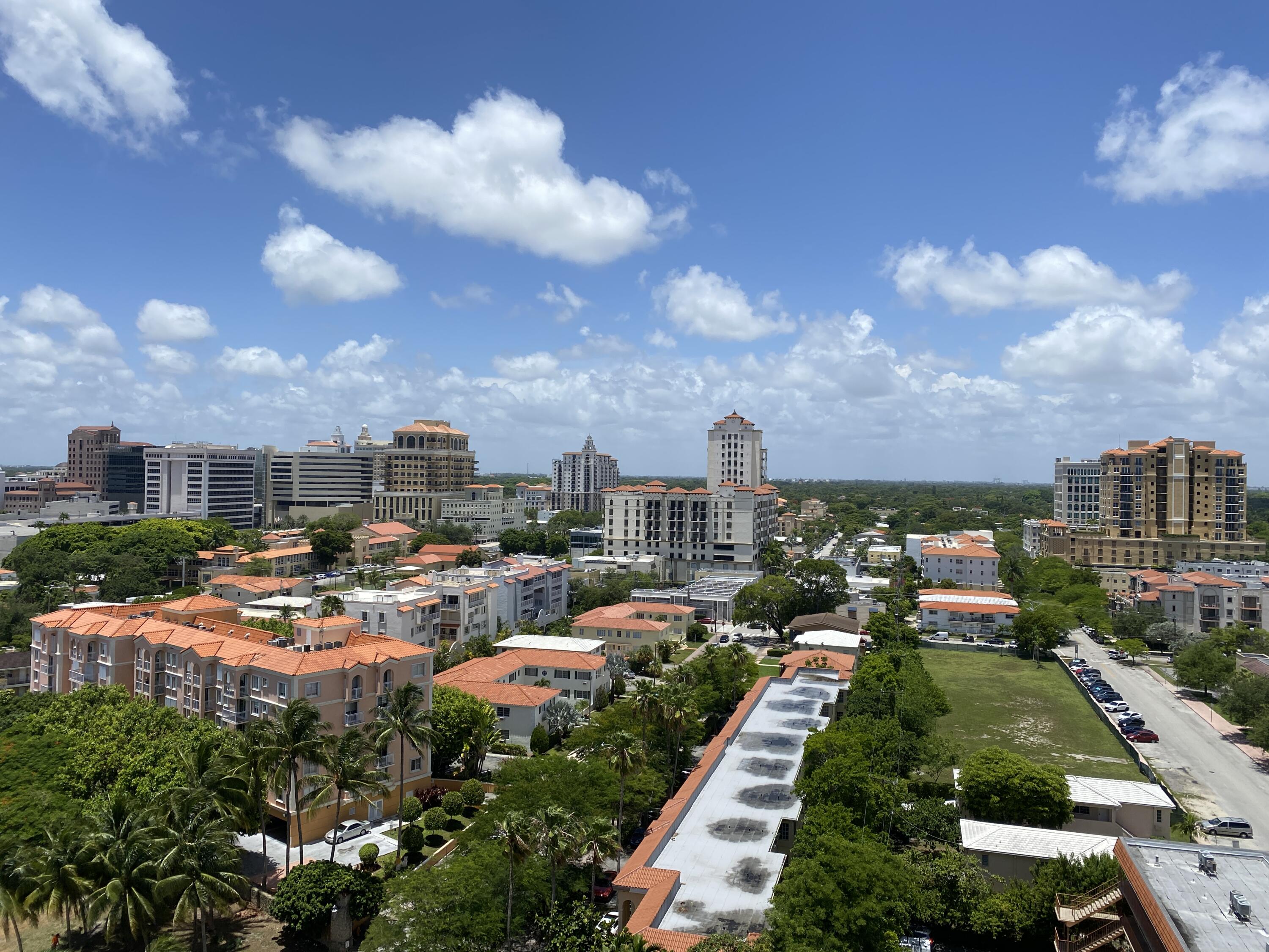 1627 Southwest 37th Avenue, Unit 1003 Miami, FL 33145 - Photo 1 of 12 an aerial view of a city