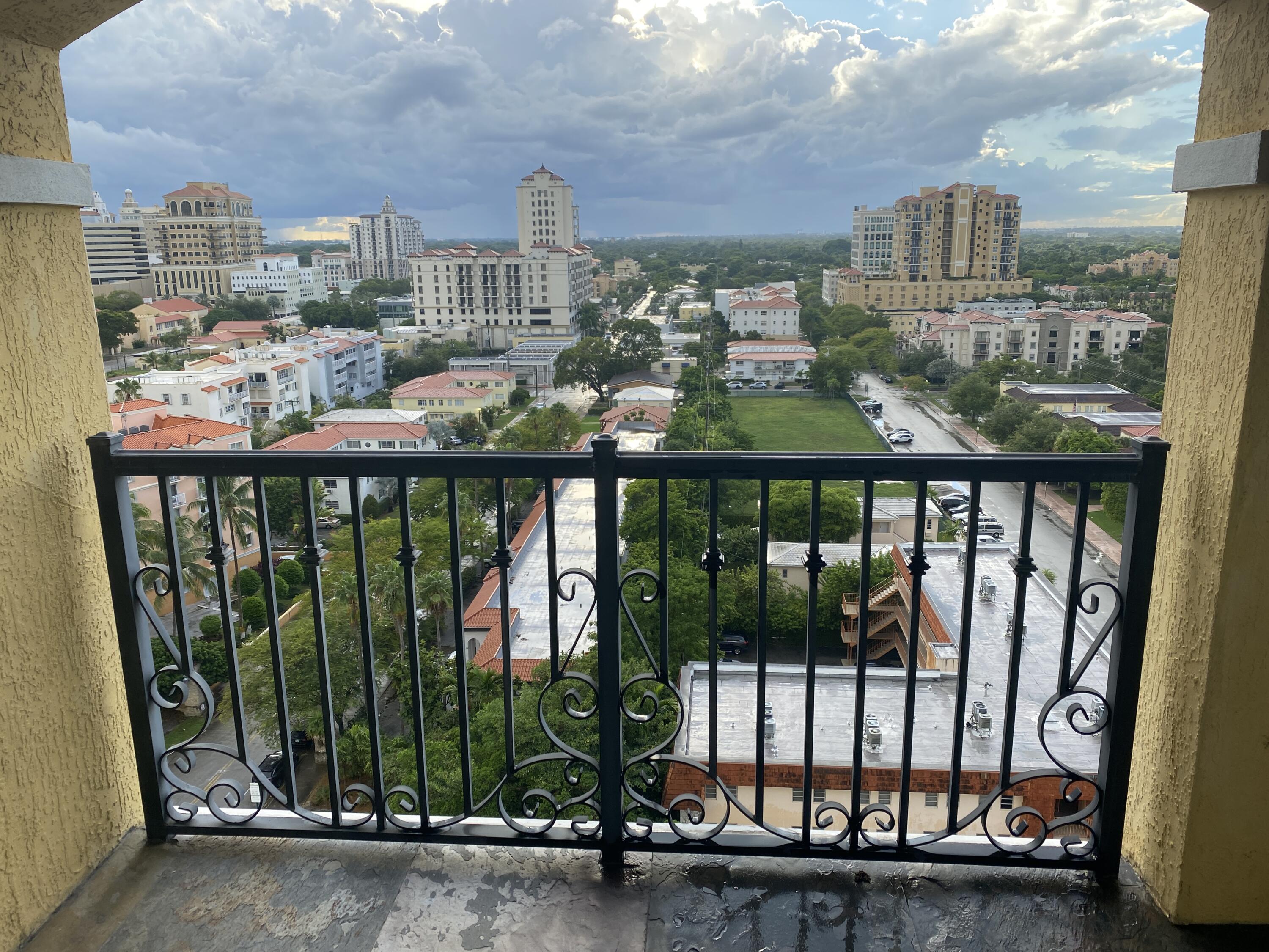1627 Southwest 37th Avenue, Unit 1003 Miami, FL 33145 - Photo 4 of 12 a view of a city from a balcony