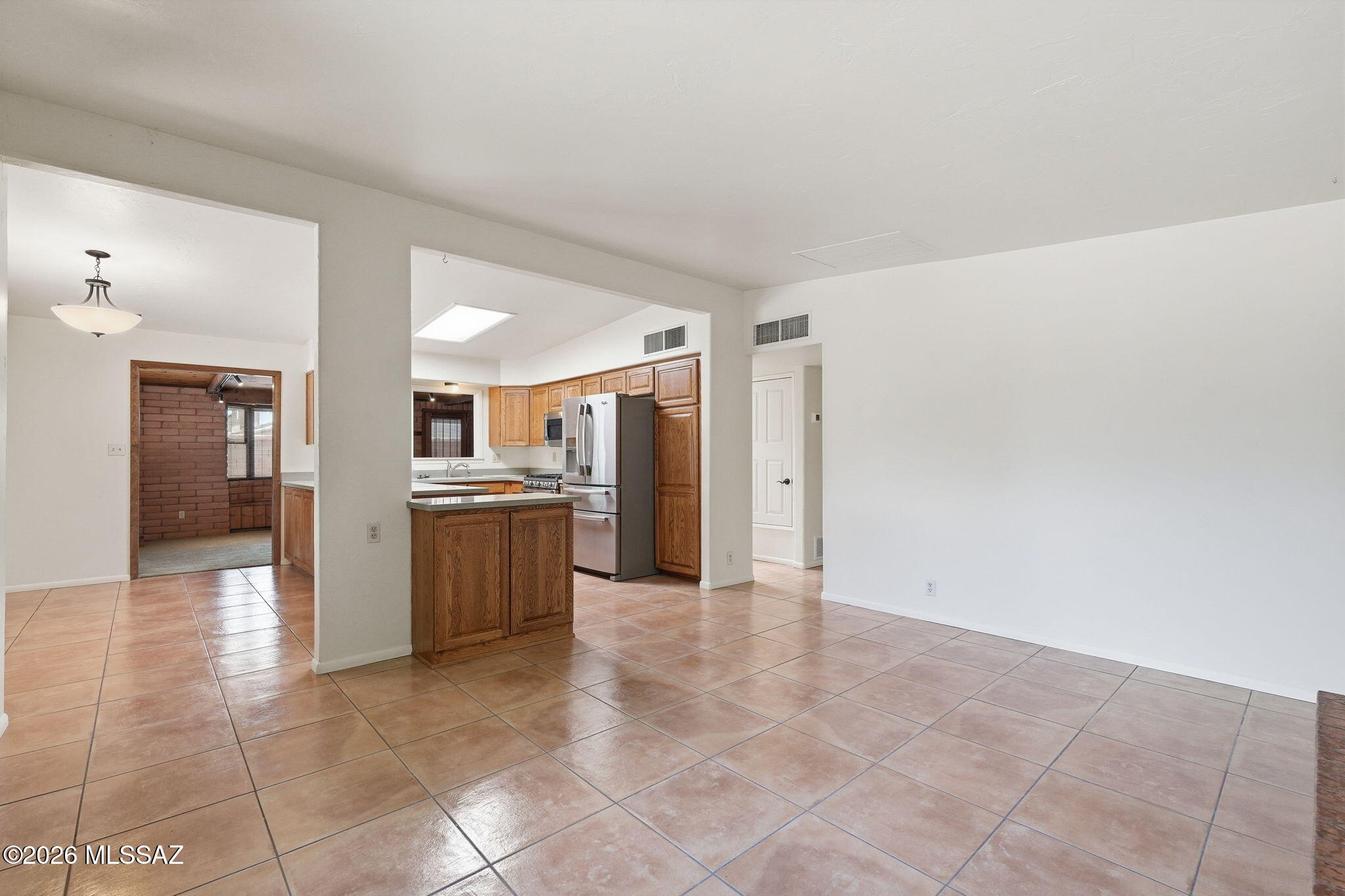 1125 East Kleindale Road Tucson, AZ 85719 - Photo 7 of 49 a view of a kitchen with a sink