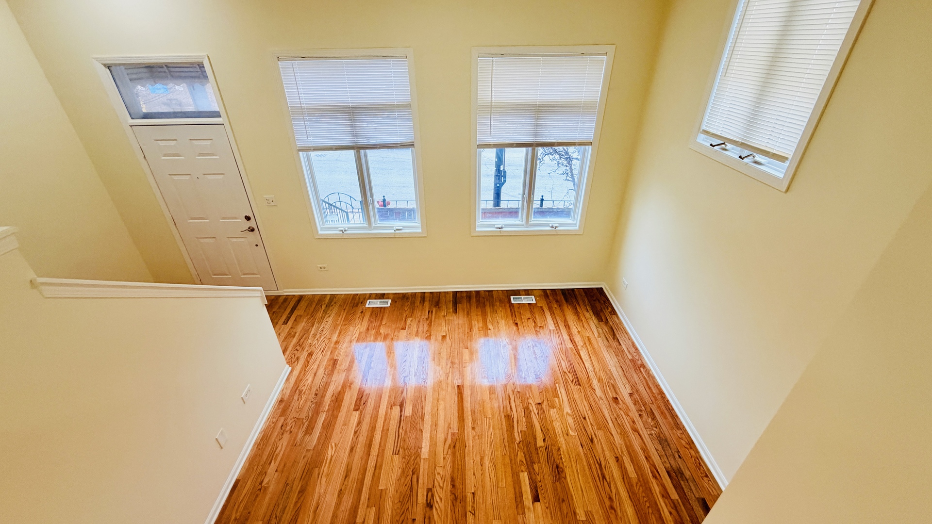 356 West 31st Street Chicago, IL 60616 - Photo 11 of 31 a view of a room with wooden floor and front door