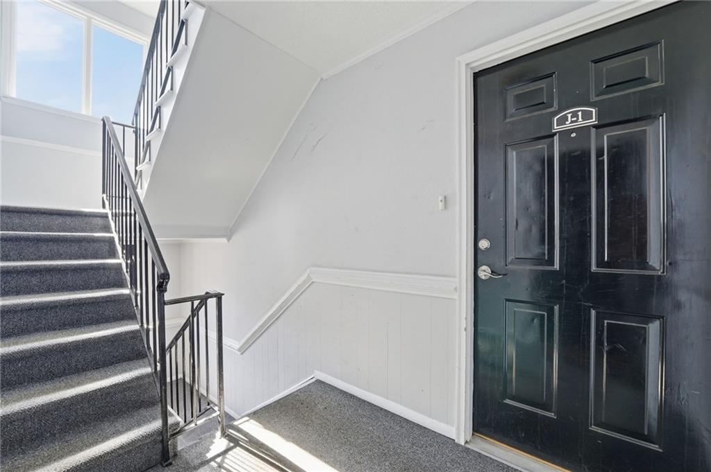 3301 Henderson Mill Road, Unit J1 Atlanta, GA 30341 - Photo 27 of 38 a view of entryway with stairs