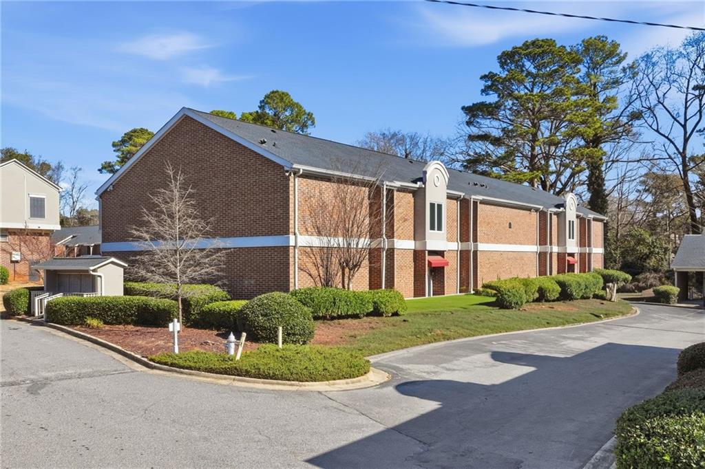 3301 Henderson Mill Road, Unit J1 Atlanta, GA 30341 - Photo 30 of 38 a view of a street in front of a building