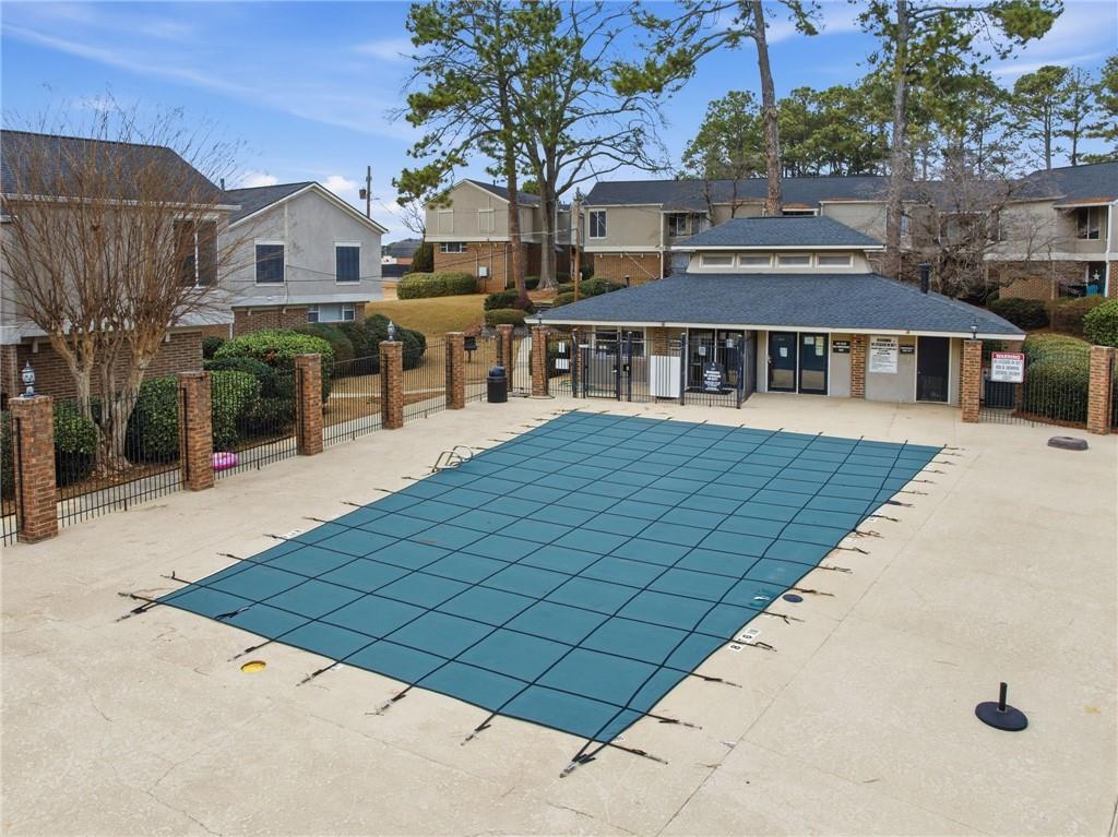 3301 Henderson Mill Road, Unit J1 Atlanta, GA 30341 - Photo 35 of 38 front view of a house with a yard