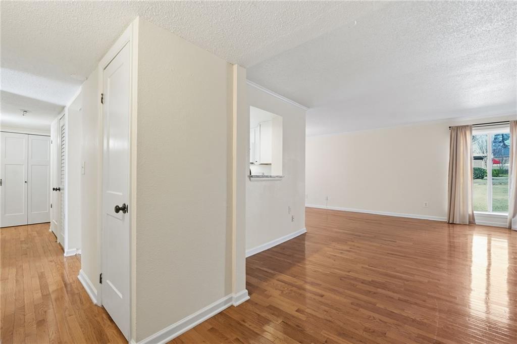 3301 Henderson Mill Road, Unit J1 Atlanta, GA 30341 - Photo 4 of 38 a view of a hallway with wooden floor