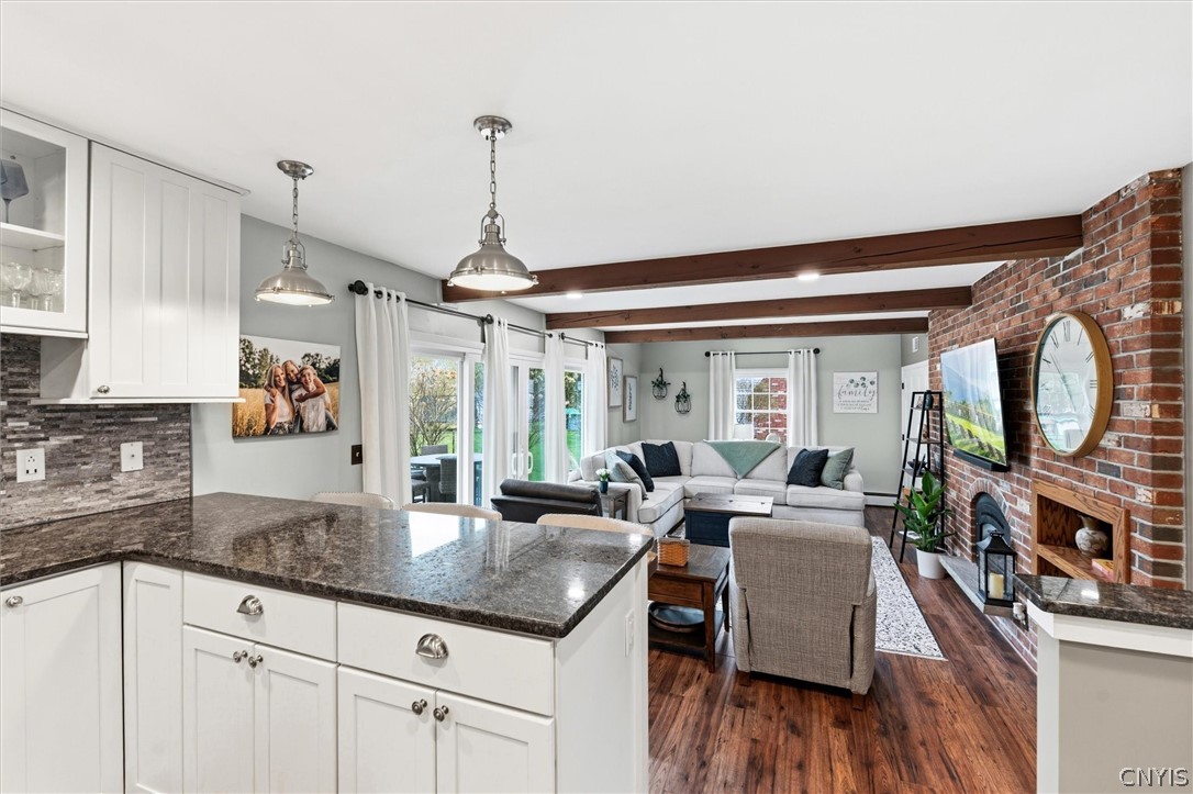 4970 Carnarvon Road Onondaga, NY 13215 - Photo 19 of 50 Stunning ceiling beams create timeless charm and a