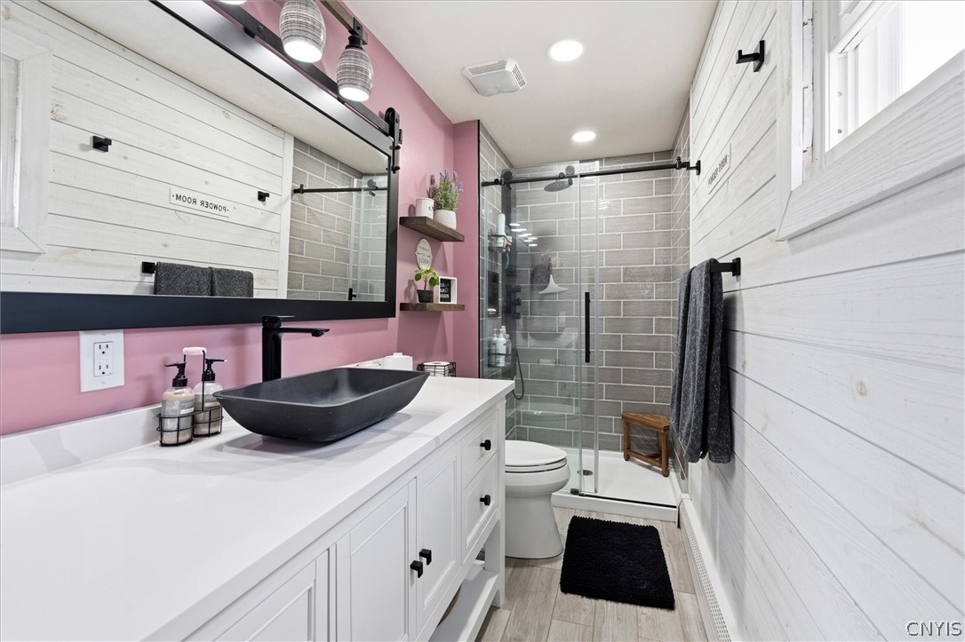 4970 Carnarvon Road Onondaga, NY 13215 - Photo 32 of 50 The beautifully updated primary en-suite bath offe