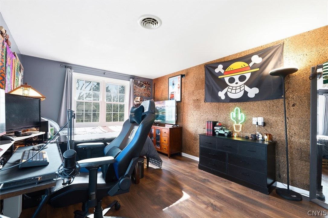 4970 Carnarvon Road Onondaga, NY 13215 - Photo 40 of 50 Warm cork accent wall enhances the room’s characte