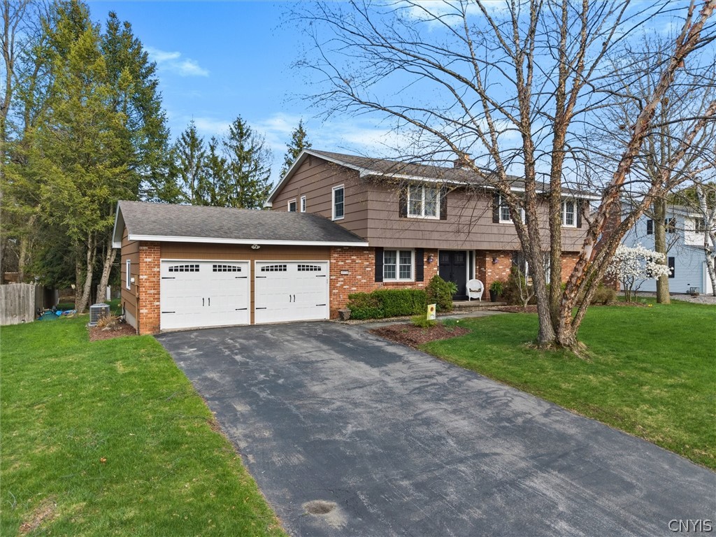 4970 Carnarvon Road Onondaga, NY 13215 - Photo 4 of 50 Set on a spacious lot in a well-established neighb