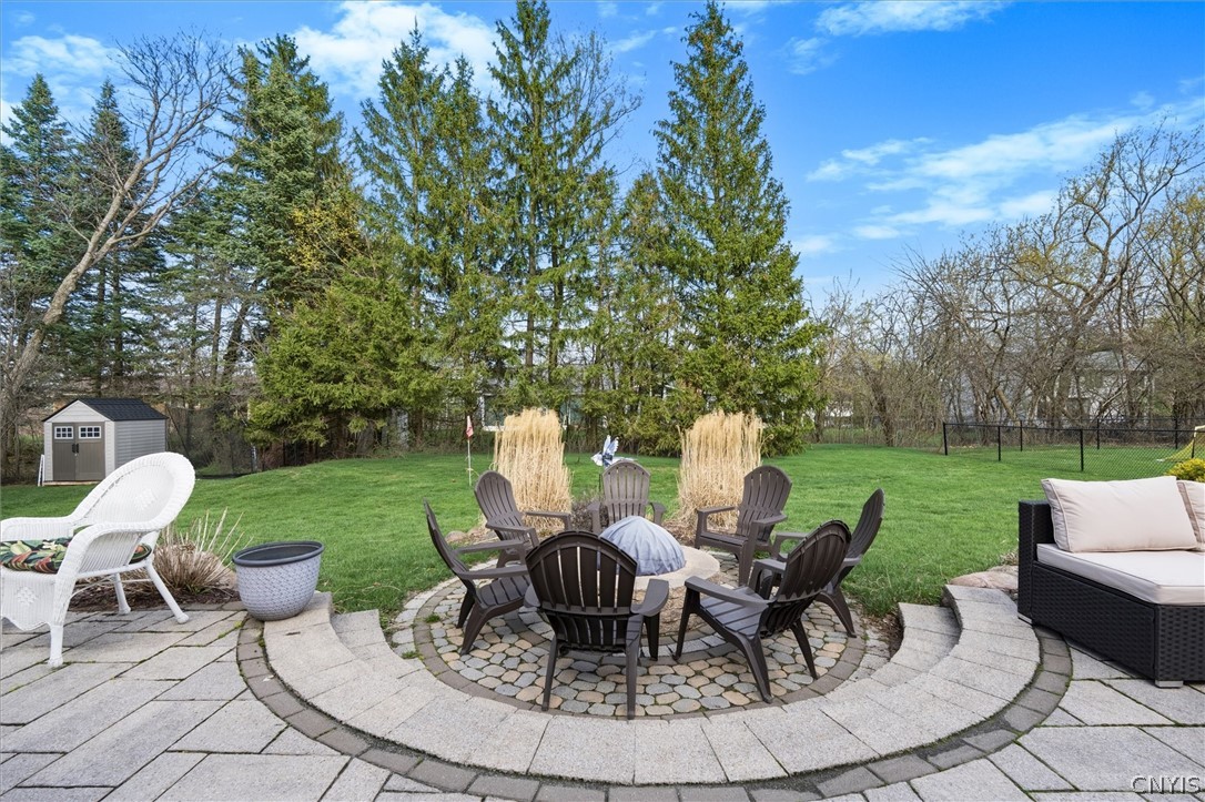 4970 Carnarvon Road Onondaga, NY 13215 - Photo 46 of 50 A cozy fire pit creates the perfect setting for re