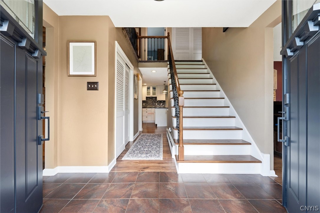 4970 Carnarvon Road Onondaga, NY 13215 - Photo 6 of 50 A warm and welcoming entry that sets the tone for