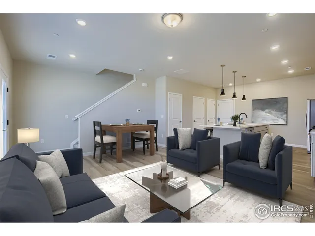 a living room with furniture and a couch